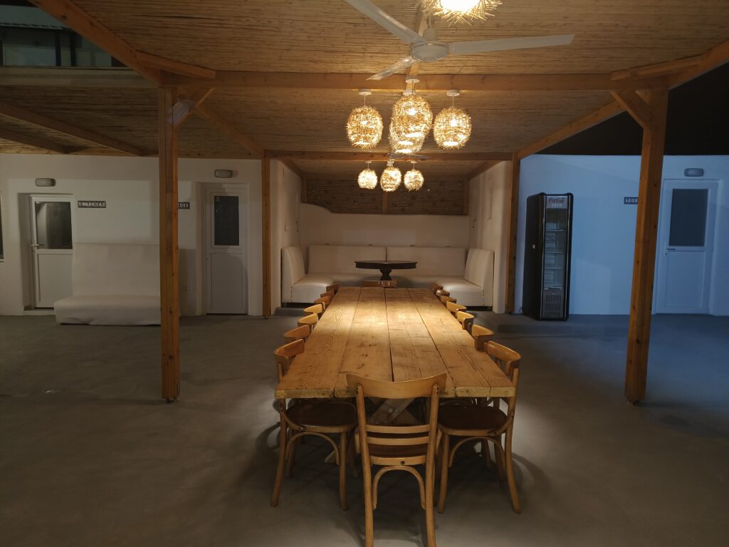 Hostel common dining space with wooden interior